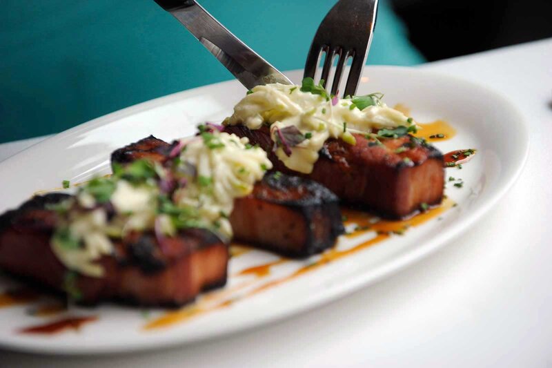 Plated meat with a cream topping